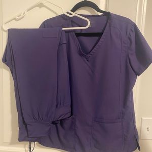 Womens med couture insight scrub set jogger and 4 packet top purple.